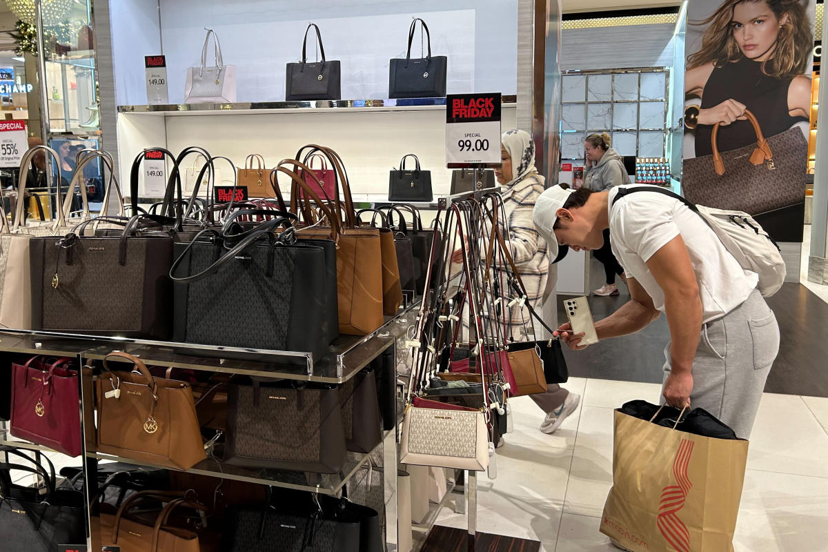 American shoppers wrap up the year in a spending mood, boding well for the U.S. economy